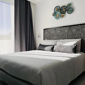 By Promenade And Apartment